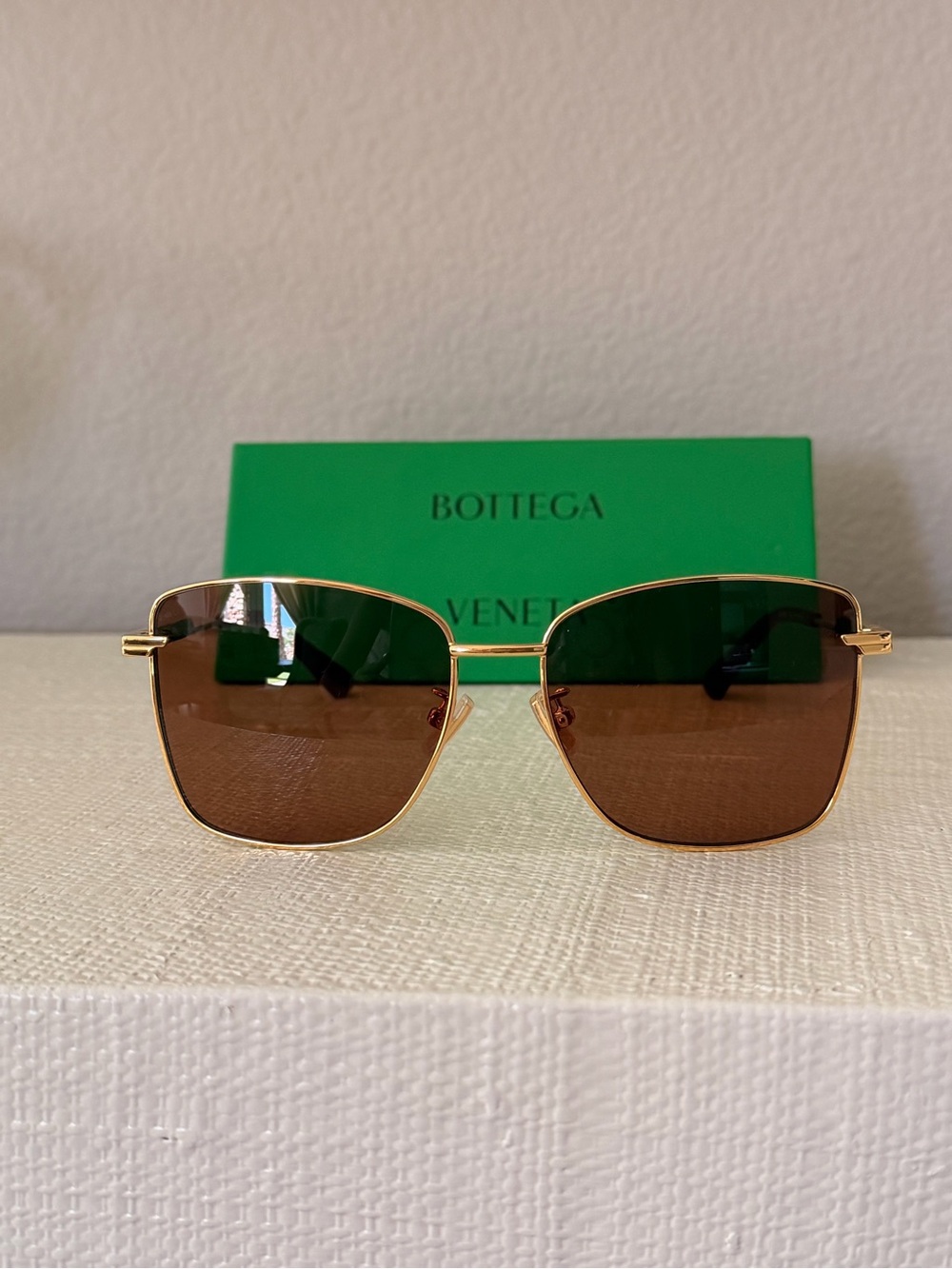 Bottega Veneta Gold Frame Sunglasses with Brown Lenses